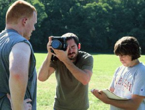 As a student, Bachelor Sports Editor Aaron Parrish '08 (rt.) teamed up for football news on the field.