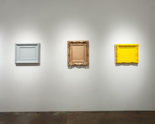 nstallation view of Matthew Deleget: Vanitas Vanitas (Pewter Gray), Vanitas (Bright Gold), Vanitas (Sun Yellow) Enamel spray paint on canvases and decorative frames