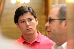 Michael Lumpkin '18 listens to lobbyist Kip Tew at the Indiana Statehouse.