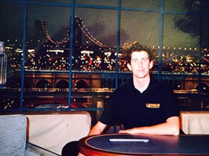 Ryan Smith '03 is one of the lucky few to sit at David Letterman's legendary desk at the Ed Sullivan Theater.