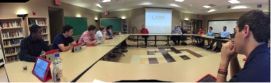 The LABB students sit and listen as Dean Raters explains their upcoming consulting project