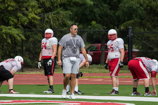 O-line coach Olmy Olmsted