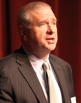 Brian speaking on campus in 2013.