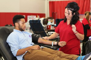 Aaron Stewart-Curet '17 donates blood regularly, but the rivalry "Bleed for the Bell" incorporates makes it a little more fun.