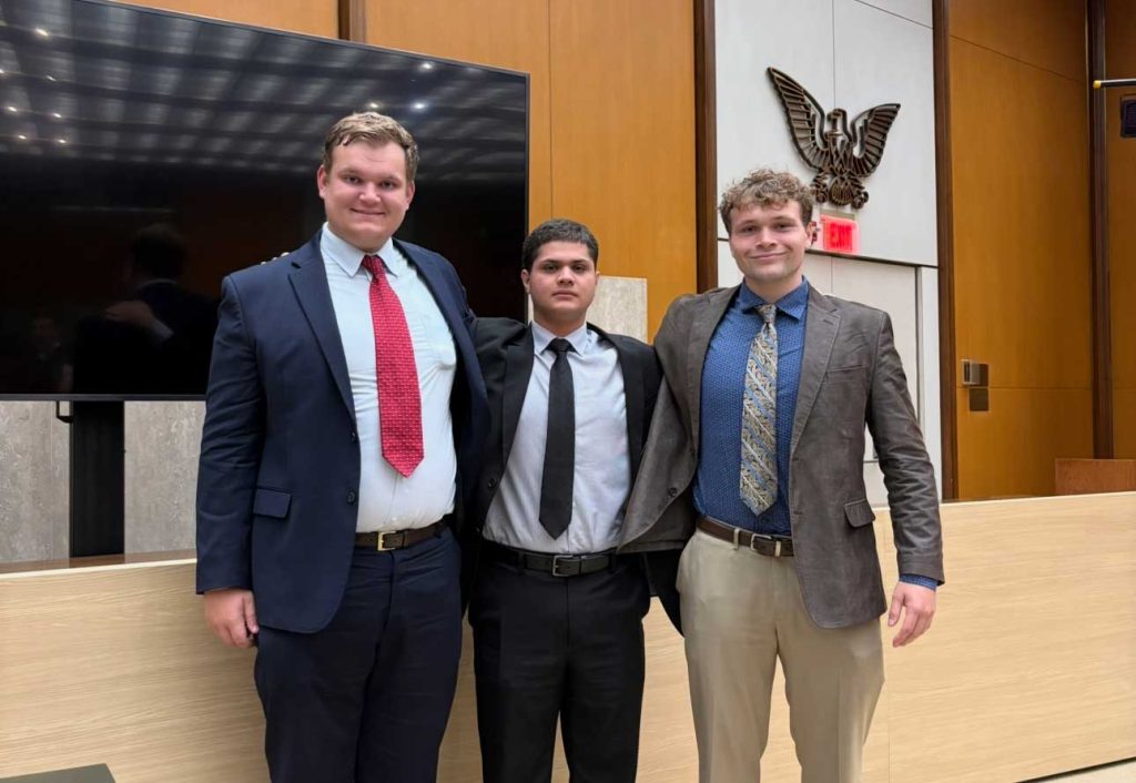 photo of Albert Bernhardt, Diego Banuelos, and Hunter Otto at the State Department.