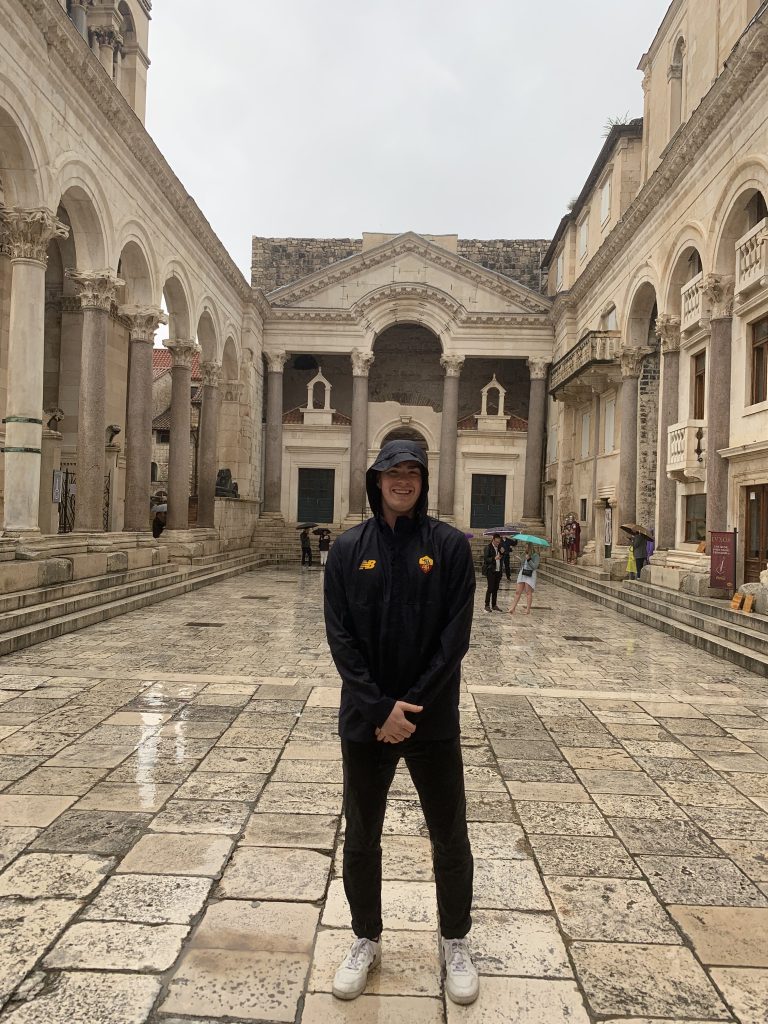 Morgan Lamon '24 stands in Diocletian's Palace, Rome, Italy