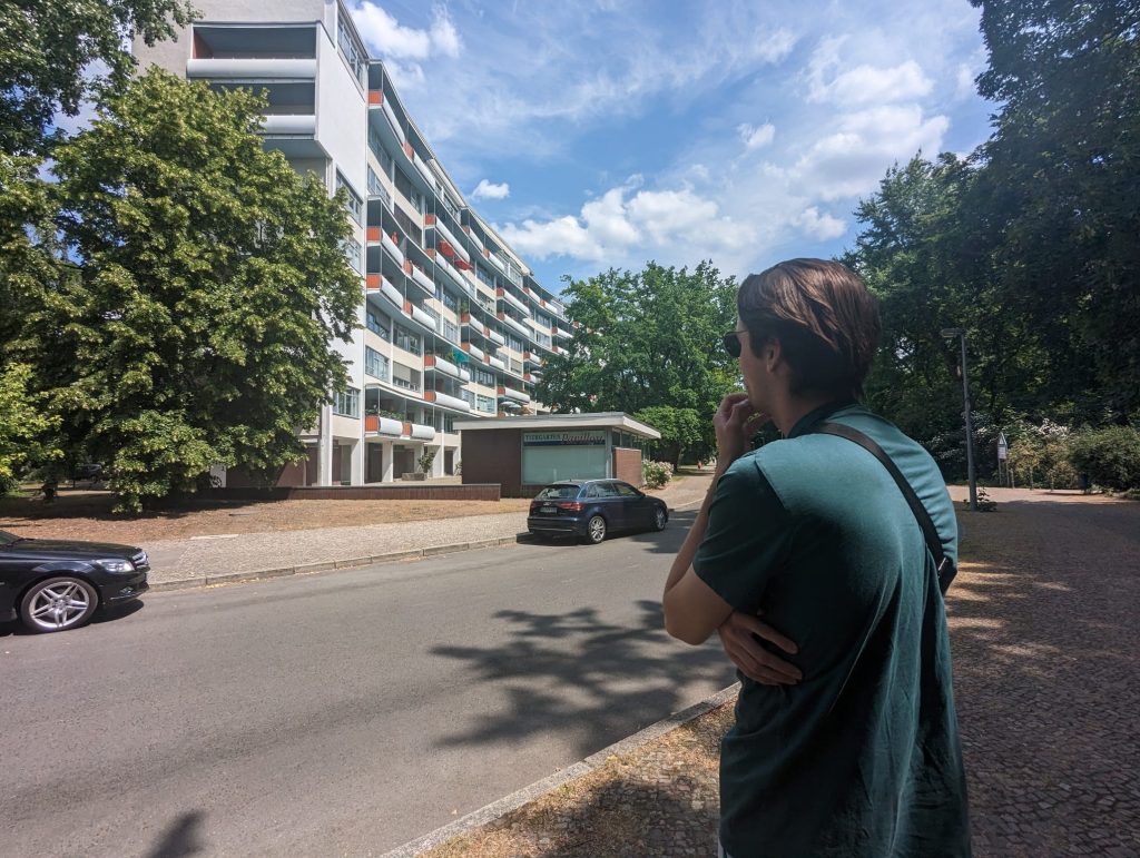 Owen Runge '24 stands in front of a building in Germany